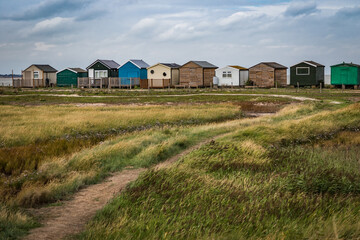 Fototapeta na wymiar Beach huts at Seasalter, Kent, England