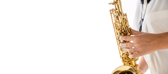 Close up woman playing saxophone isolated on white studio background. Inspired musician, details of art occupation, world classic instrument for jazz and blues. Concept of hobby, creativity. Flyer