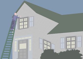 Low angle view of a man standing on a ladder