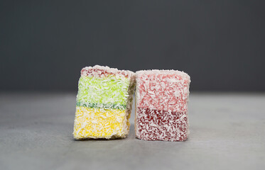 multicolored delicious Turkish Delight on gray background
