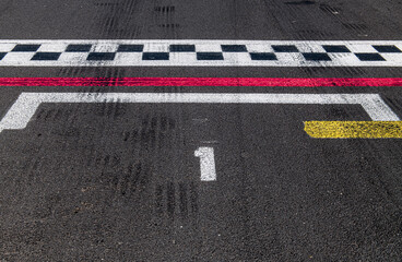 Number one position close up ranking on racing asphalt track
