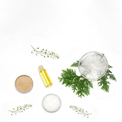 Ingredients for the production of cosmetics on a white background. Herbal powders, dried flowers, menthol crystals, oil. Natural cosmetics concept.