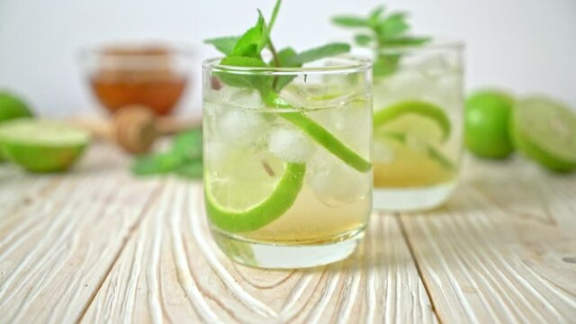 iced honey and lime soda with mint - refreshing drink