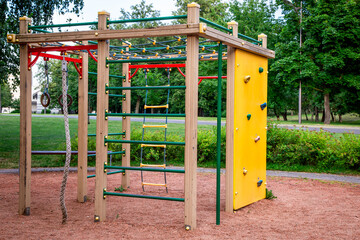 Fototapeta na wymiar Playground, slide, stairs. A place for children to play. Gymnastics children's sports ground.