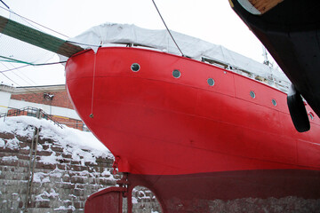 Boat hull in shipyard in the winter