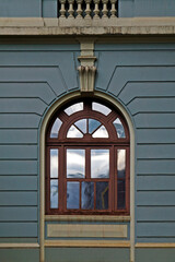 Ancient window at gray facade, Belo Horizonte city, Brazil