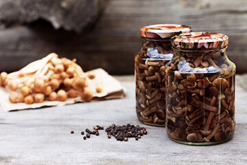 mushrooms in a glass jar, homemade pickles