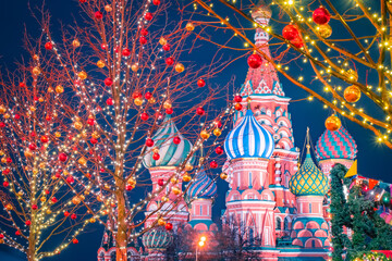 Christmas greetings from Russia. St. Basil Cathedral on the background of Christmas decorations. Christmas decorations on red square. New year in Moscow. Christmas evening in the capital of Russia.
