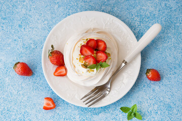 Anna Pavlova cake with cream and strawberries