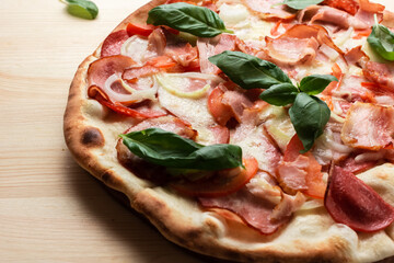 pizza with salami tomatoes and Basil