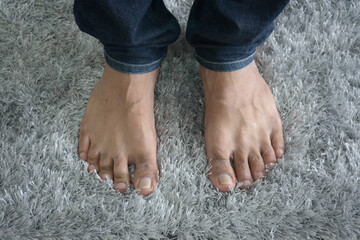 Bare feet on carpet