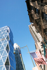 Low angle view of an American flag on a building, New York City, New York State, USA