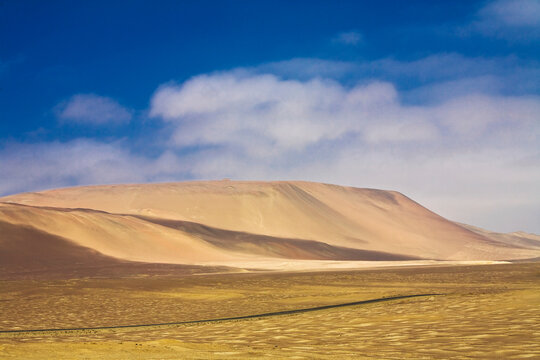 Sand dunes in a desert, Paracas National Reserve, Paracas, Ica Region, Peru