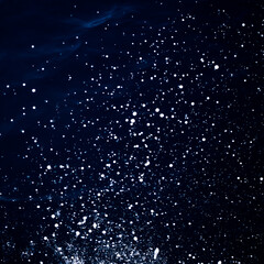 starry night sky looking wave with water drops
