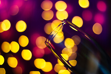 Champagne glass, wine close up on bokeh background