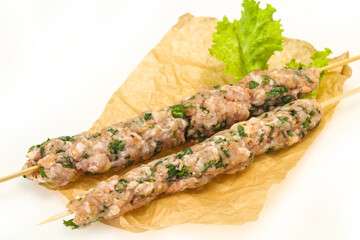Raw minced pork skewer kebab for grill