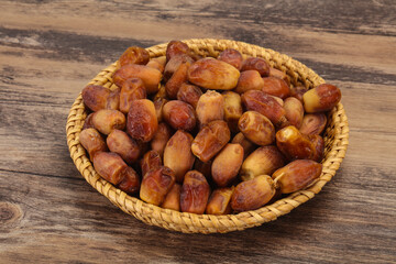 Sweet tasty dry dates in the basket