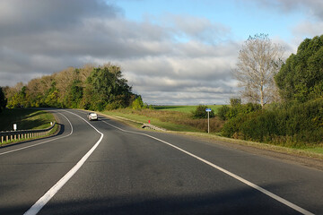 Fototapeta premium road landscape on a clear autumn morning