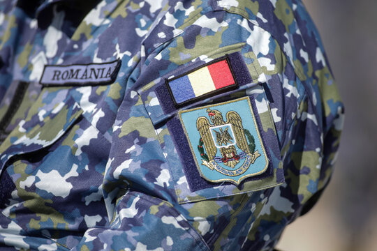 Logo of the Romanian Air Force on the uniform of an officer.