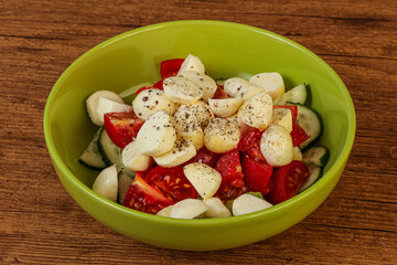 Salad with vegetables and mozzarlla