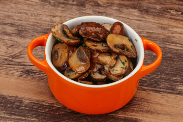 Roasted champignon with herbs and spices