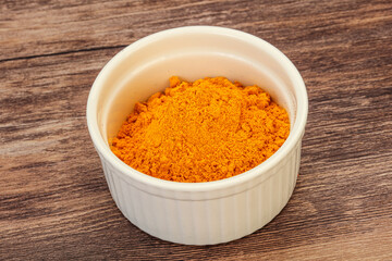 Tumeric powder in the bowl