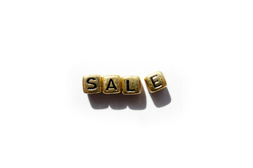 The concept of sales, discounts. Inscription on cubes isolated on white background, grunge style