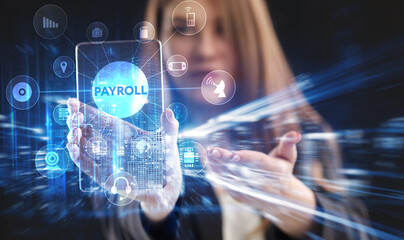 Business, Technology, Internet and network concept. Young businessman working on a virtual screen of the future and sees the inscription: Payroll