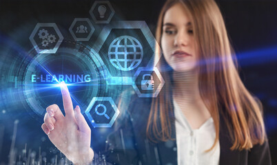 Business, Technology, Internet and network concept. Young businessman working on a virtual screen of the future and sees the inscription: E-learning
