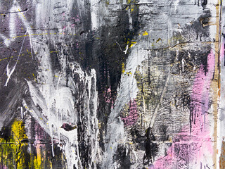 Rough paint dripping, spray paint artwork. Abstract background oil paint painting style. Damage to walls with many colors. Rough concrete surface with cracks, scratches and paint stains