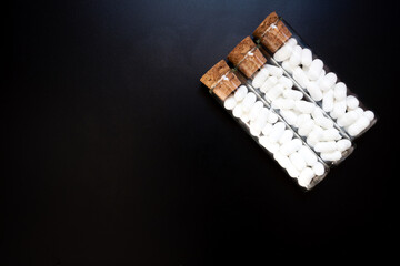 Jordan almonds in glass tube, wedding decoration