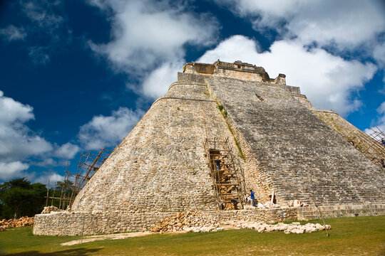 Workers restoring a pyramid, Pyramid of the Magician, Uxmal, Yucatan