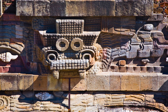 Sculpture carved on the wall of a temple, Temple of Quetzalcoatl, Teotihuacan, Mexico