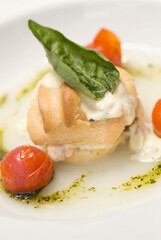 High angle view of a sandwich garnished with basil 
