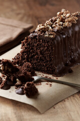 Chocolate cake on rustic background. Close up. 