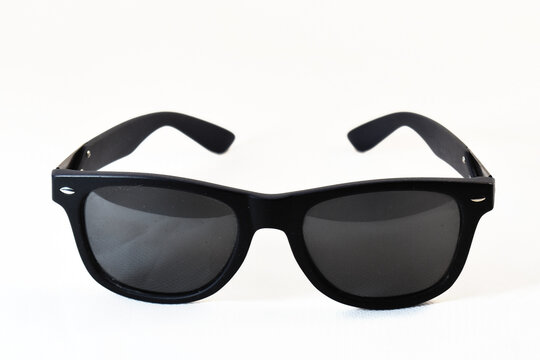 Black Sunglasses On A White Background