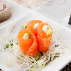 Close-up of salmon sushi rolls