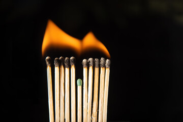 Phosphorus sticks with fire access on black background