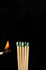 Phosphorus sticks with fire access on black background