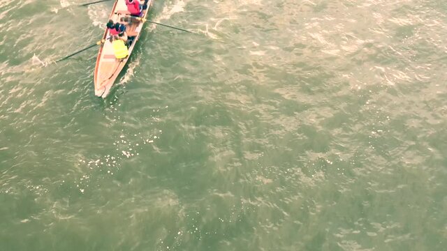 rowing row team shot from above Ariel view.  copy space stock footage - unidentifiable people