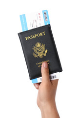 Woman holding passport and ticket on white background, closeup. Travel agency concept
