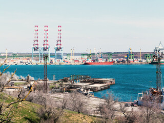 Naklejka na ściany i meble Odessa, Ukraine - March 21, 2019: Industrial and trade terminal in the seaport near Odessa, Ukraine