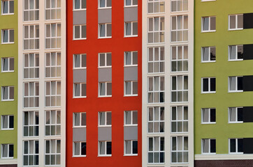 Fototapeta na wymiar Fragment of a new multi-storey residential public building