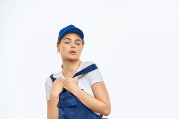 Woman in working uniform blue cap delivery courier delivery service