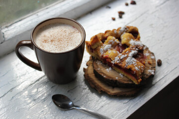 cup of coffee and chocolate cake. baked apple pie with chocolate