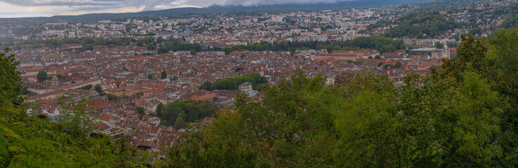 Fototapeta na wymiar Besançon, France - 08 29 2020: Panoramic view of the city and the citadel walls from the fort of Chaudanne