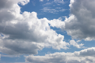 Blue sky with fluffy clouds