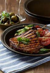 Grilled Turkey Breast with fresh salad. Close up.	