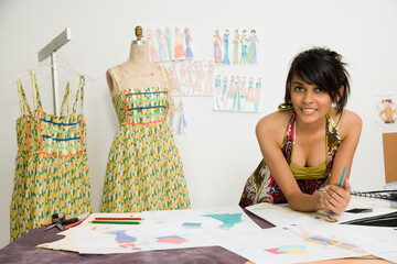 Indian female fashion designer in workshop