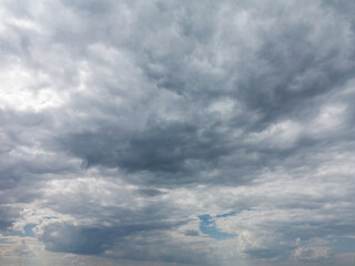 Divine sky. White fluffy clouds in the blue sky. Blue sky background with tiny clouds. Panorama